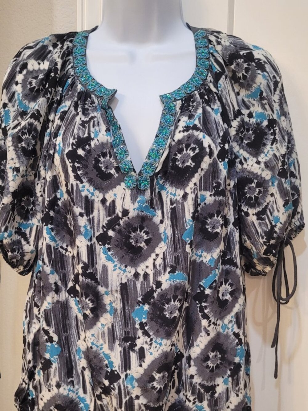 Karen Kane , size S, teal and black print